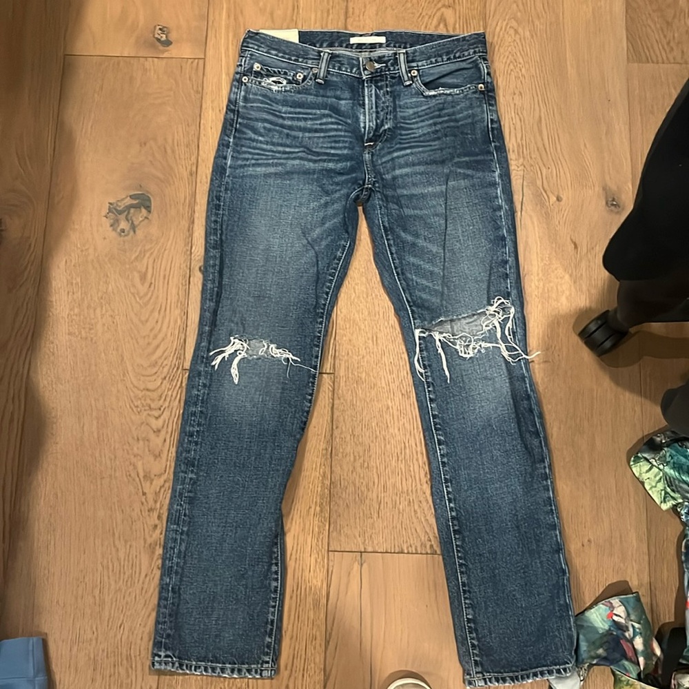 Ripped darker wash Abercrombie and Fitch Jeans, size 30’32